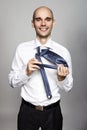 Businessman getting dressed Royalty Free Stock Photo