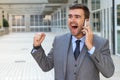 Businessman getting phenomenal news on the phone Royalty Free Stock Photo