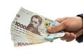 Businessman gives bribe or pay, in isolation. UAH. 1000 new banknote Ukrainian money