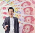 Businessman gives a handshake with China banknote background
