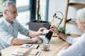 Businessman giving business card to client Royalty Free Stock Photo