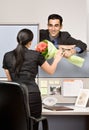 Businessman giving co-worker flowers Royalty Free Stock Photo