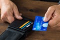 Businessman Giving Credit Card From Wallet Royalty Free Stock Photo