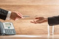 Businessman Giving Pen to Partner to Sign Contract Royalty Free Stock Photo