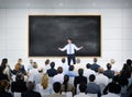 Businessman Giving Presentation in Board Room