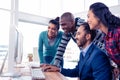 Businessman giving training to team Royalty Free Stock Photo