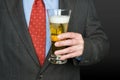 Businessman with glass of beer