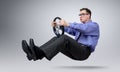 Businessman in glasses car driver with a steering wheel Royalty Free Stock Photo