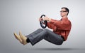 Businessman in glasses car driver with a steering wheel Royalty Free Stock Photo