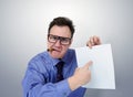 Businessman in glasses holding a paper. Royalty Free Stock Photo