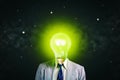 Businessman with a glowing light bulb instead of a head. Starry sky. Concept of new ideas. Business. Lifestyle Royalty Free Stock Photo