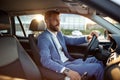 Businessman going on business trip by car Royalty Free Stock Photo