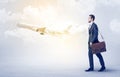 Businessman going somewhere with airplane Royalty Free Stock Photo