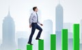 Businessman going up the bar chart in growth concept Royalty Free Stock Photo