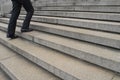 Businessman going up stairs