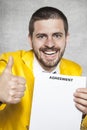 Businessman in a gold suit and thumbs up, the new agreement Royalty Free Stock Photo