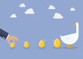 Businessman with goose and golden egg Royalty Free Stock Photo