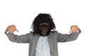 Businessman with gorilla head indicating