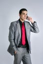 Businessman with gray suit talking cellular Royalty Free Stock Photo