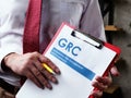 Businessman with GRC Governance risk management and compliance documents. Royalty Free Stock Photo