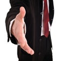 Businessman with greeting outstretched hand. Royalty Free Stock Photo