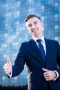 Businessman greeting with somebody Royalty Free Stock Photo
