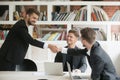 Businessman greeting welcoming new partner or making deal with h Royalty Free Stock Photo