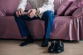 Businessman or groom wears shoes Royalty Free Stock Photo