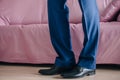 Businessman or groom wears shoes Royalty Free Stock Photo