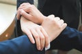 businessman group hold each other hands