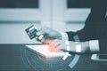 Businessman Hacker is using a hand typing keyboard and uses a modern credit card by laptop screen hack code on the White backgroun