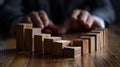 Businessman halts domino effect. Ai Generated