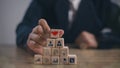 Businessman hand arranging wood block with agreement Ideas partnership symbol, Planning for goals against business success, Royalty Free Stock Photo