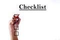 Businessman hand checking mark on checklist