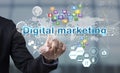 Businessman hand chooses Digital marketing wording on interface Royalty Free Stock Photo