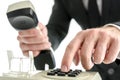 Businessman hand dialing a phone number Royalty Free Stock Photo