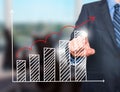 Businessman hand drawing growth graph on visual screen Royalty Free Stock Photo