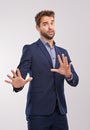 Businessman, hand gesture and studio to refuse or decline business offer with concern on white background. Portrait