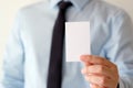 Businessman hand holding blank white business card with copy spa Royalty Free Stock Photo