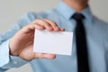 Businessman hand holding blank white business card with copy spa Royalty Free Stock Photo