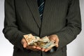 Businessman hand holding euro money. Royalty Free Stock Photo