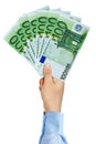 Businessman hand holding fan of 100 Euro Banknotes Royalty Free Stock Photo