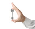 Businessman hand, holding key isolated Royalty Free Stock Photo