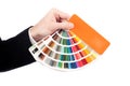 Hand holding a pantone palette