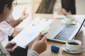 Businessman hand holding pen in meeting room Royalty Free Stock Photo