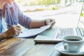 Businessman hand holding pen over agreement form Royalty Free Stock Photo