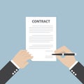 Businessman hand holding pen and signing business contract Royalty Free Stock Photo