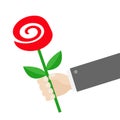 Businessman hand holding red rose flower. Giving gift concept. Cute cartoon character. Black suit. Greeting card. Flat design. Whi Royalty Free Stock Photo