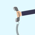 Businessman hand holding retro telephone vector illustration