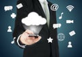 Businessman hand holding smart phone cloud connectivity Royalty Free Stock Photo